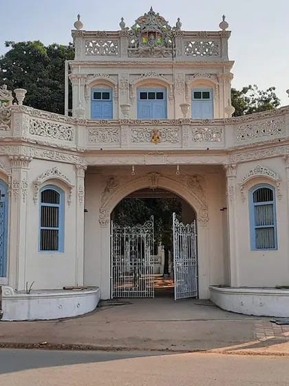 The restoration of Rhodesia House in Dharmaj, Gujarat, was a project of reviving not just a building, but a piece of the town's history. This daytime view shows the intricate facade, a blend of European and Indian architectural styles, brought back to its original grandeur to serve as a new cultural hub for the community.
