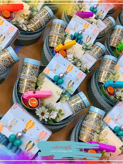 Celebrate a baby's first festival with our special milestone giveaways. This image shows a bulk order of 'First Holi' hampers, complete with colorful, baby-safe items designed to make the occasion joyful and memorable.