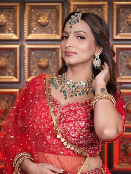 This stunning traditional bridal look was created by one of our talented students. We teach the art of creating a radiant, classic red bridal look with perfectly blended eyeshadow, glowing skin, and a timeless appeal that our students master.