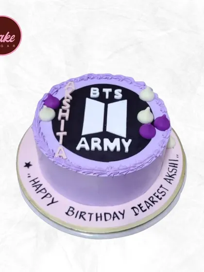 A cake for the BTS Army! This purple cake is decorated with the BTS and ARMY logos, perfect for a K-pop fan's birthday.