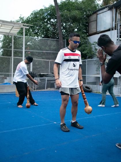 Our Level 1 instructor program has trained elite professionals, including members of the Indian Army Special Forces, athletes, and yoga teachers. This image shows a coach instructing a new cohort, ready to dive deep into a training format that has lasted centuries.