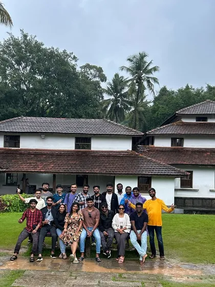 Our group posing in front of Kuvempu's home, Kavimane. I love adding these cultural experiences to my trips.