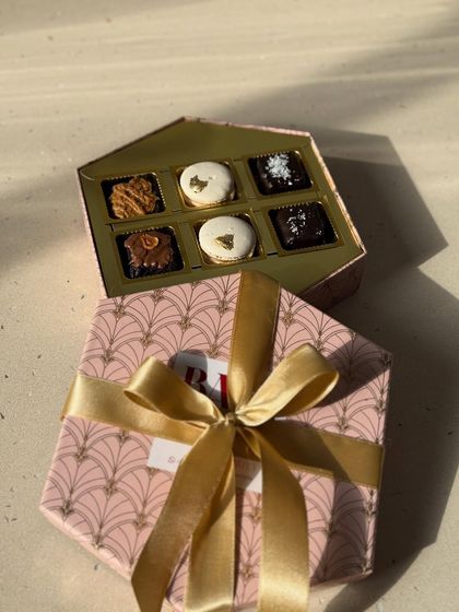 The elegant and compact Mini Sweet Treat Hamper, perfect for Diwali gifting. It contains six assorted bite-sized desserts.
