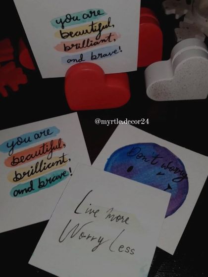 Our hand-painted Polaroid cards, featuring motivational quotes like "You are beautiful, brilliant, and brave." These make a wonderful, personal addition to our heart photo holders.