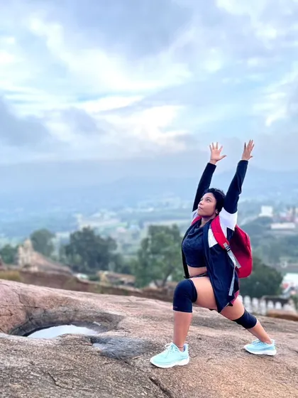 Another angle of the warrior pose, feeling grounded and strong against the landscape. This is what we work towards: the ability to confidently enjoy life and movement again.