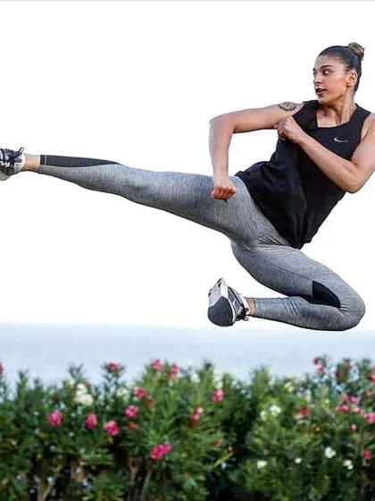 The explosive power of a flying side kick. This showcases the advanced athleticism and coordination we develop through our kickboxing and MMA training programs. It's about pushing your physical limits to achieve what you thought was impossible.