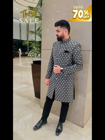 This modern patterned sherwani is a stylish choice for any groom. It's another fantastic piece available in my thrift sale.