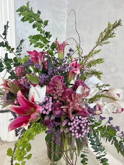 Another angle of this crazy, beautiful arrangement. The combination of textures and the deep burgundy and pink tones make it a truly stylish and unique piece of floral art.