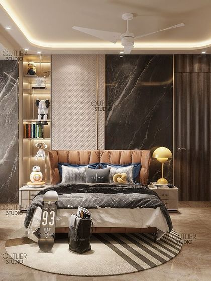 Come and take a look at this bedroom where creativity meets luxury. The design uses a mix of dark marble, wood paneling, and a leather-look headboard to create a sophisticated and modern space for a young adult.