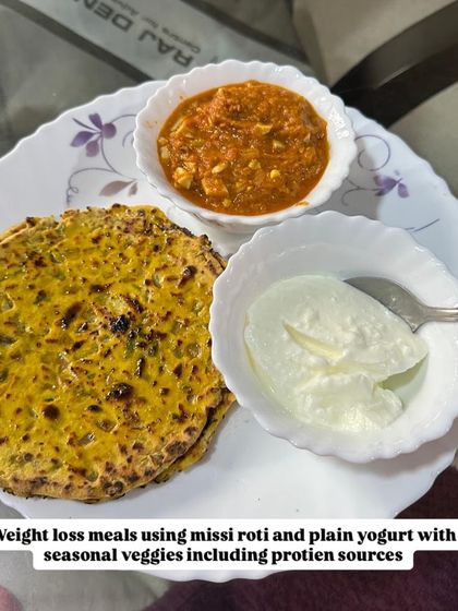 A weight loss meal featuring missi roti, plain yogurt, and a side of seasonal veggies. This is a protein-packed and fiber-rich option.