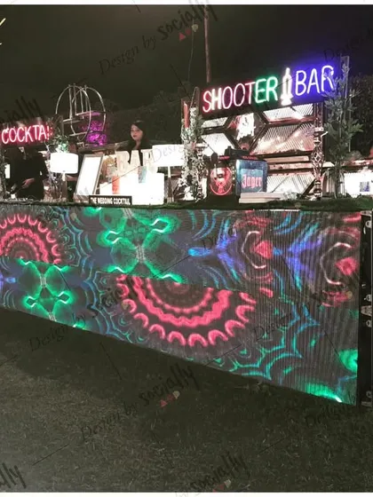 I provide complete, professional bar setups that become a centerpiece for your event. This large LED bar can be customized with graphics and visuals to match your party's theme.