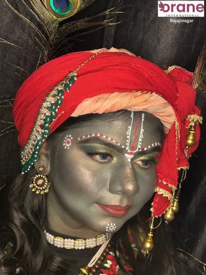 A close-up of the Krishna look, highlighting the detailed face painting and traditional turban.