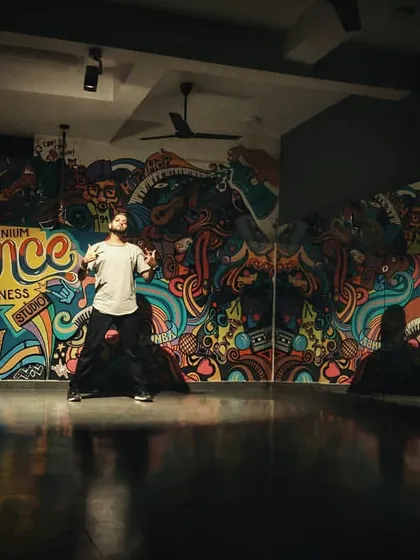 An artistic shot of me in my element at the studio. This is my space to create, teach, and share my passion for dance.