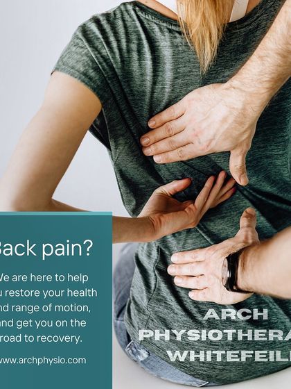 Suffering from back pain? Our hands on approach, seen here with a therapist applying targeted pressure to the lower back, is designed to restore your health and range of motion, getting you on the road to recovery.