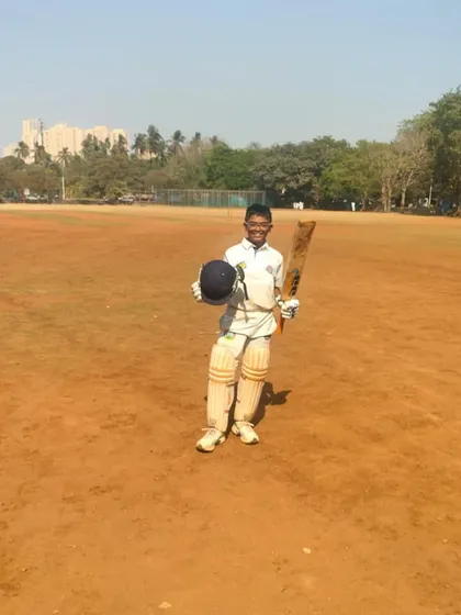 Parth Rane celebrating his half-century during the Mumbai Champions Trophy.