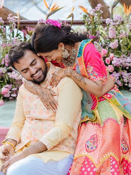 A repeat of image 418, a tender close-up of the couple, their foreheads touching.