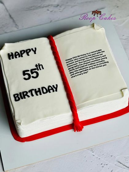 A story in every slice. This cake is designed to look like an open book, complete with a personal message for a remarkable teacher on her 55th birthday. A perfect theme for any book lover.
