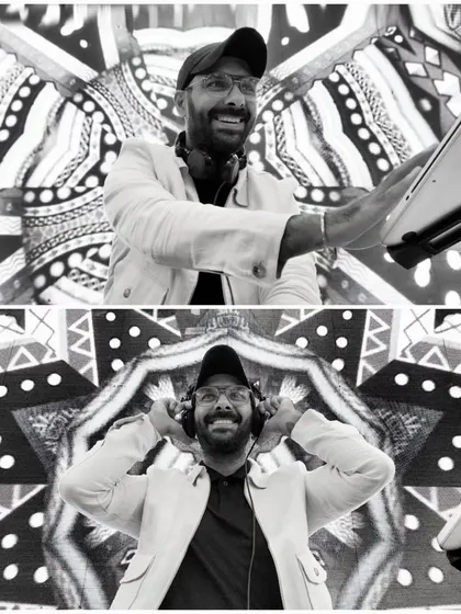 A cool, black and white kaleidoscopic shot from behind the decks.