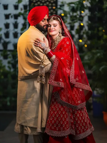 Love knows no boundaries. This intimate portrait from a cross-cultural Sikh wedding captures a moment of quiet comfort and affection, showcasing the beautiful blend of traditions and the universal language of love.