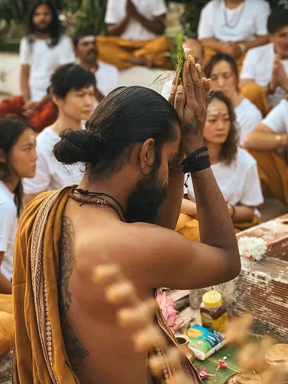 This is a duplicate of image 73, showing a moment of collective prayer and devotion during one of our outdoor ceremonies.