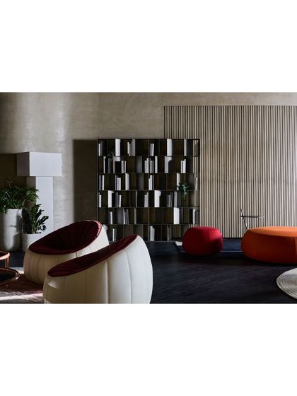 Another view of the study area, showing how the space is arranged to feel functional and inviting. The vertical wood paneling adds texture and visual height.