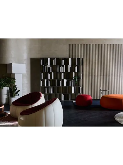 Another view of the study area, showing how the space is arranged to feel functional and inviting. The vertical wood paneling adds texture and visual height.