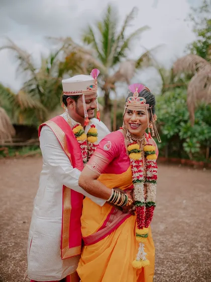 A playful and happy moment between the newly married couple.