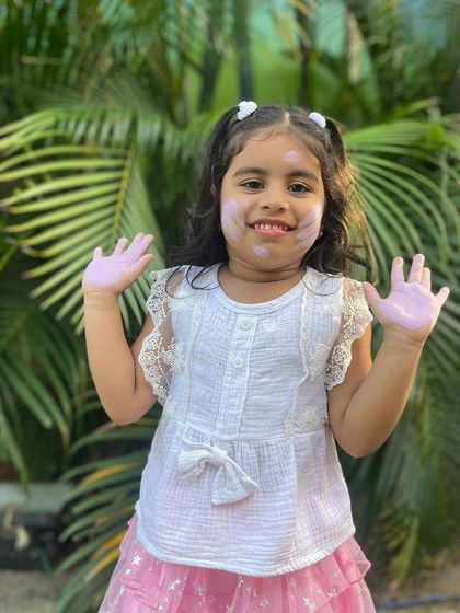 Look at that happy smile. This is what a safe and joyful Holi looks like with my non-toxic, skin-friendly colours.