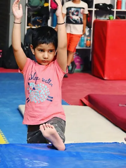 Perfecting the lunge. This fundamental pose is crucial for balance and is a building block for many advanced gymnastic skills.