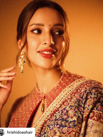 Another stunning shot of Tripti Dimri. Her classic hair color complements the traditional styling perfectly.