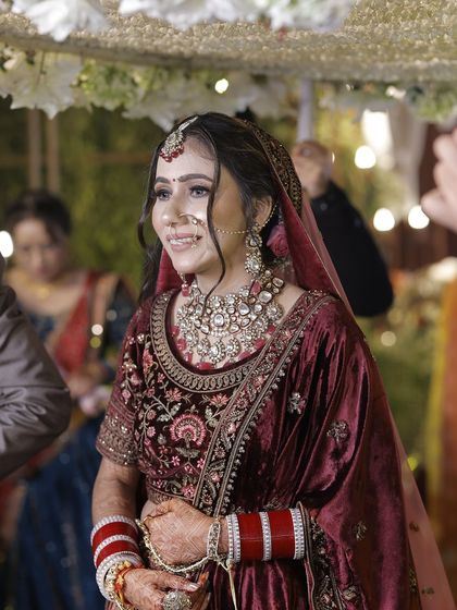 A candid shot of the bride during the ceremony, looking radiant and happy.