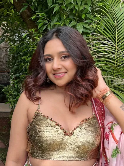A confident and happy client, rocking her soft glam look. The makeup is designed to be both beautiful and comfortable to wear.