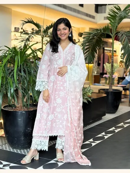 Another one of my classic pink kurta sets. This one features a beautiful floral print with delicate lace on the sleeves and pants for a coordinated look.