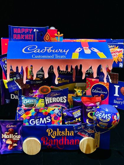 The ultimate treat for a chocolate lover. My Cadbury-themed hamper is designed like a truck, overflowing with Dairy Milk, Gems, 5-Star, and other favorites.