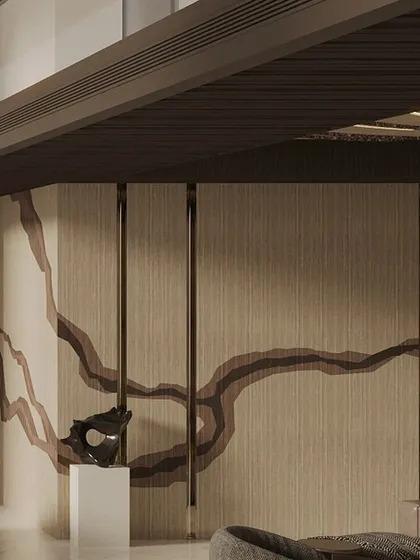 This image highlights a bespoke wall treatment in a penthouse living room. The organic, flowing pattern adds an artistic and unique touch to the space, complemented by a sculptural piece on a pedestal.