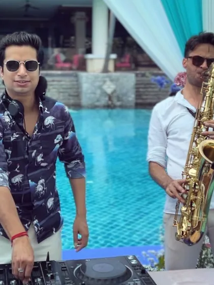 Elevating a poolside party in Hua Hin, Thailand by teaming up with a live saxophonist. This fusion of DJ beats and live instruments adds a layer of sophistication and creates a unique performance.