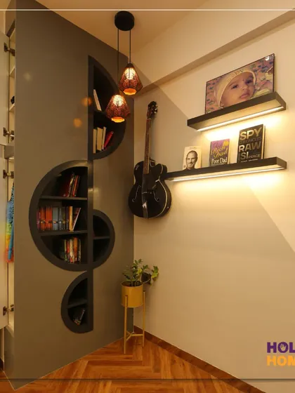 A close-up of the custom-built bookshelf shaped like a musical clef. This unique piece serves as both a storage solution and a stunning piece of wall art, reflecting the occupant's love for music.