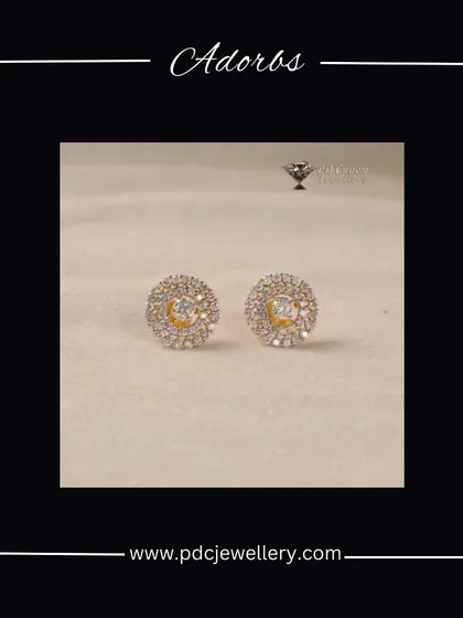 Adorn yourself with these classic round diamond stud earrings. The double halo of smaller diamonds enhances their sparkle, making them a timeless addition to your collection.