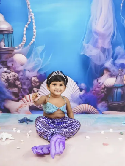 A slightly wider angle of the mermaid set, showing more of the beautiful ocean-themed backdrop and props.