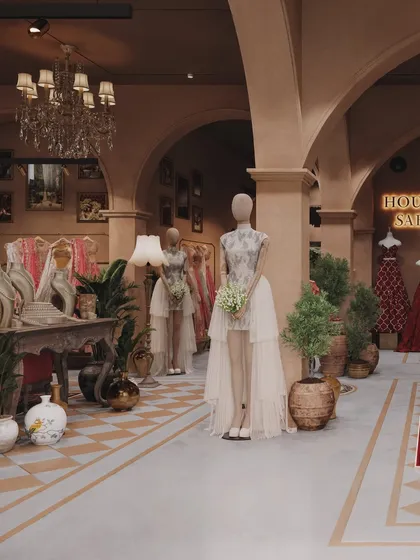This angle shows the thoughtful placement of mannequins, making them feel like sculptures within the space.