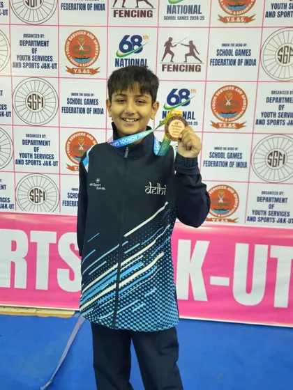 Vivashwan proudly shows off his Bronze medal from the 68th National School Games. Each medal represents a story of personal growth and relentless effort.
