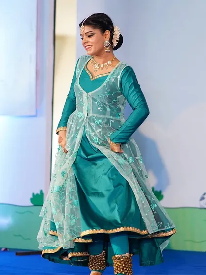 A smile shared with the audience during my performance at the CIDCO Auditorium. The joy of dance is something I love to share, making each performance an interactive and uplifting experience.
