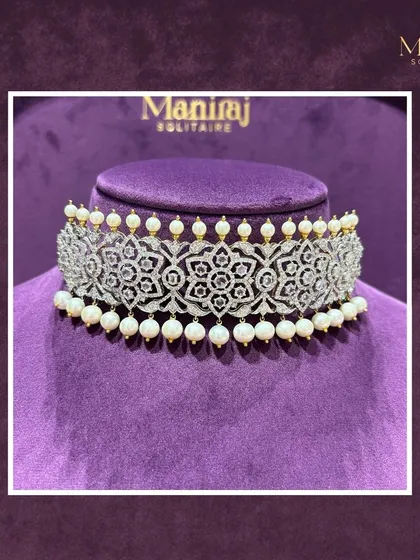 This is what I call wearable art. An intricate diamond choker with delicate pearl drops, designed to sit perfectly and catch the light from every angle. This piece shows how traditional elements like pearls can be used in a modern, regal design that feels both timeless and fresh.
