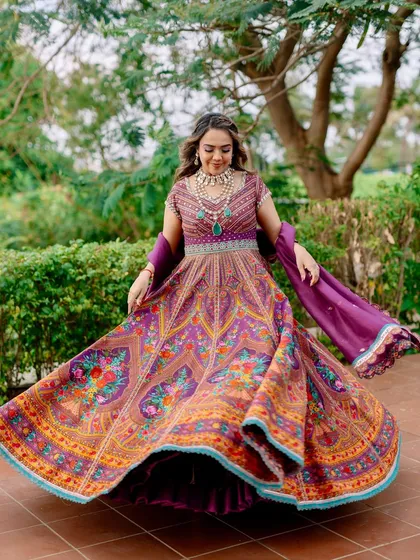 A twirl of happiness. This bride's offbeat Mehendi look is bursting with colors, joy, and celebration. I love creating unique and radiant styles like this.