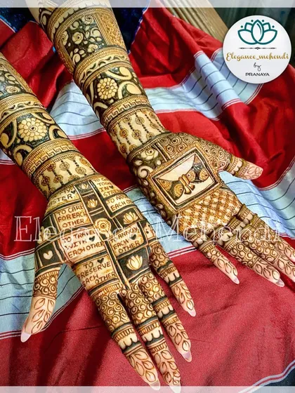 A closer look at the custom bridal mehendi with the seven vows of marriage written in blocks on the palm.