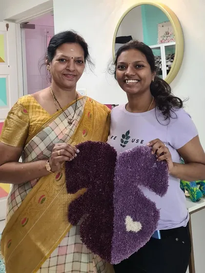 This mother and daughter created a picture-perfect heart rug that fits together. It's a beautiful symbol of the connection they shared during their workshop session.