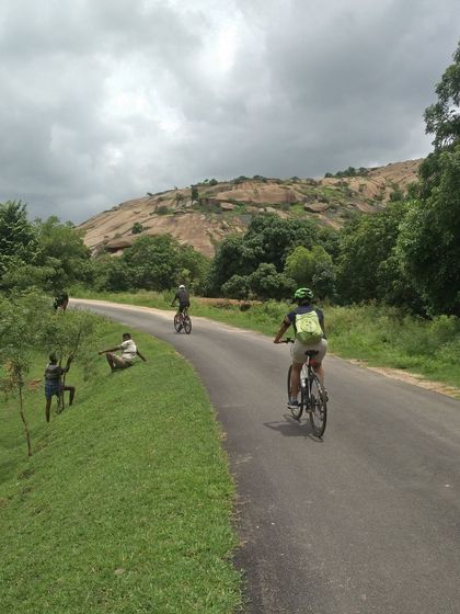Cyclists share the road with local shepherds on the 'Reservoir Dogs' tour. It's a ride that connects you with the landscape and its people.