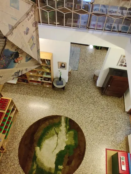 A bird's-eye view of our classroom, showing the flow of the space and the variety of learning areas. The environment is designed to support both individual work and collaborative projects.
