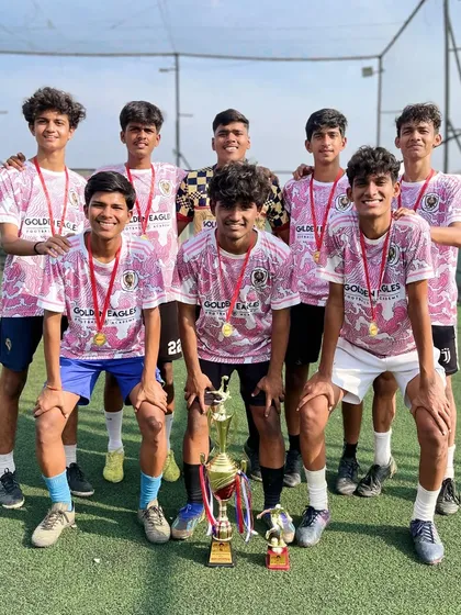 Winners in our hometown of Dombivli. The Under 18 boys team proudly displays their trophy and medals after a successful local tournament.