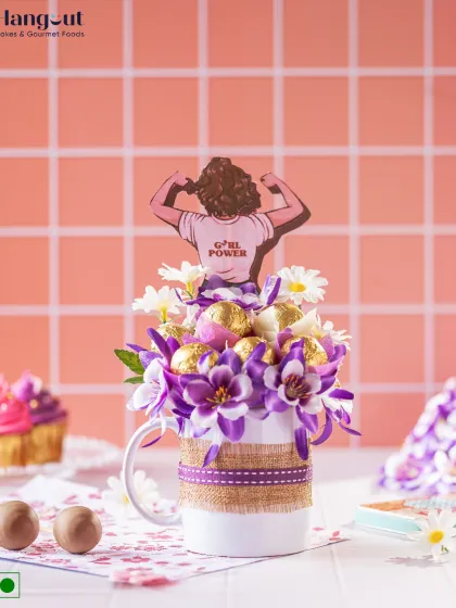 This 'Girl Power' gift hamper is for the fierce and fabulous women in your life. A mug is filled with Ferrero Rocher chocolates and decorated with flowers, making it a perfect Women's Day surprise.
